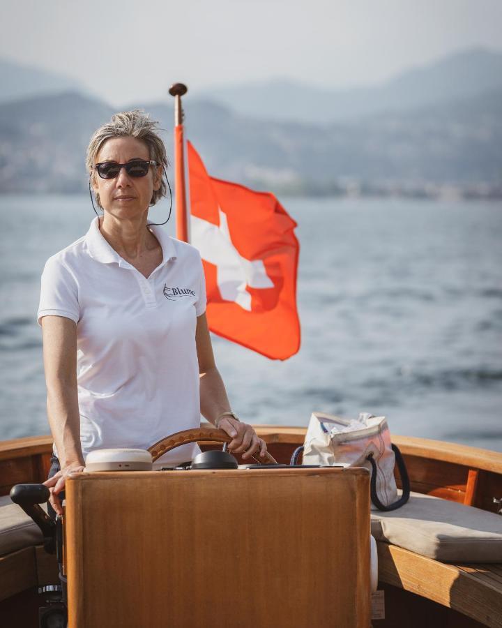 Grand Hotel Campione Campione dʼItalia Esterno foto A Swiss woman on a boat