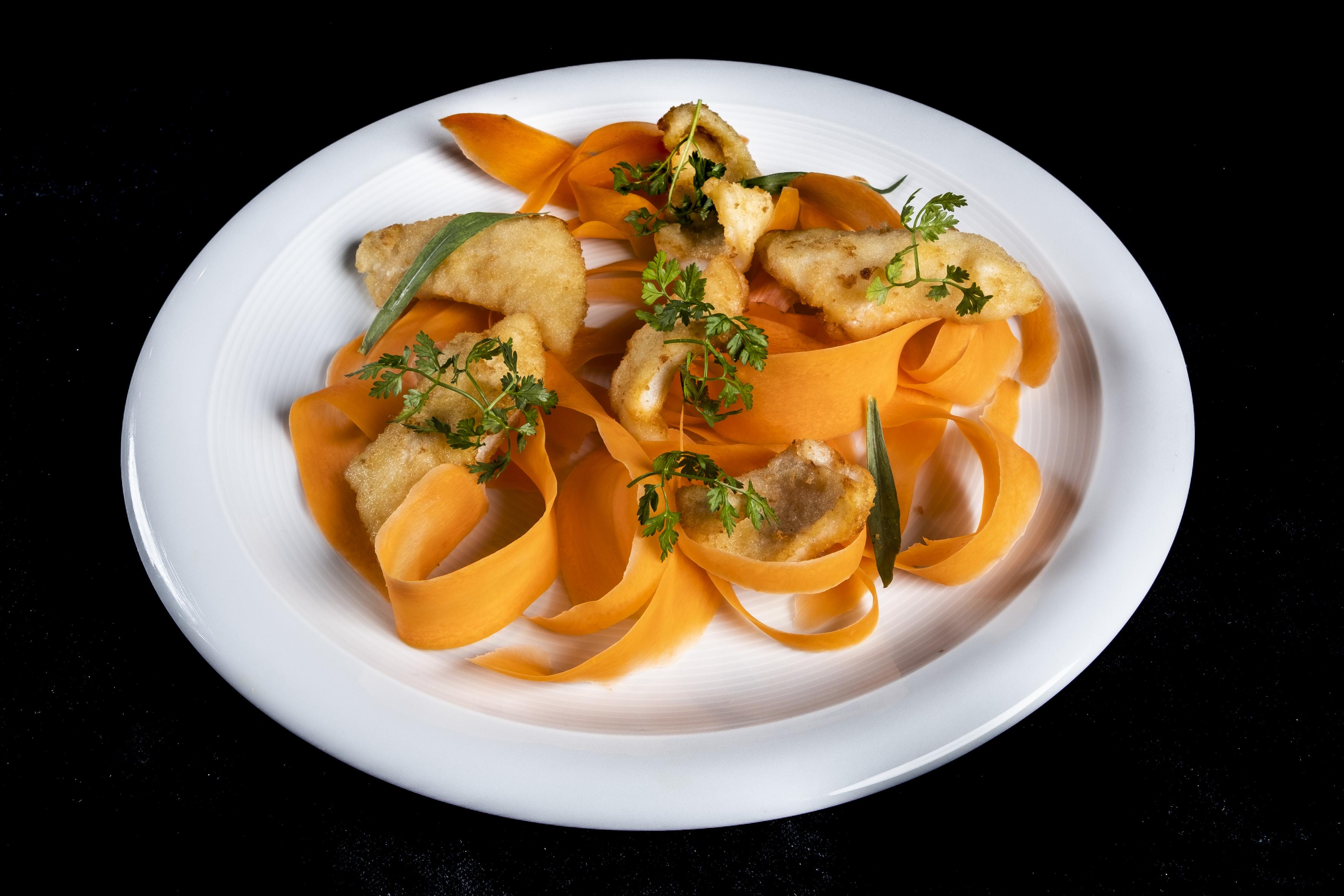 Grand Hotel Campione Campione dʼItalia Esterno foto A plate of carrot salad